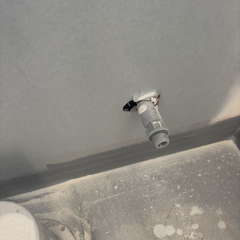 Rough plaster patching left at joints and corners, found during a fixing inspection in Maddingley
