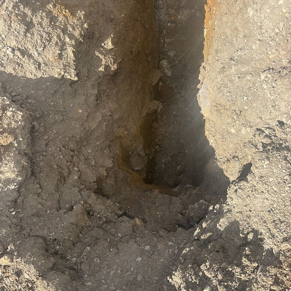 Pier hole needing its base cleaned down to firm ground, found during a bored pier inspection in Gisborne