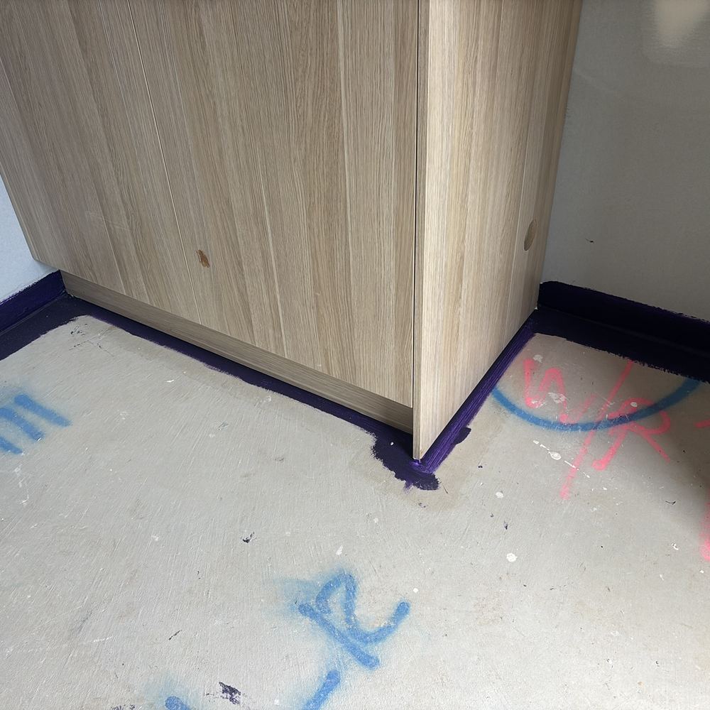 Waterproofing behind the cabinets still to be confirmed by the builder, found during a waterproofing inspection in Maddingley